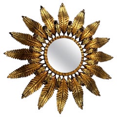Miroir Sunburst français en métal doré des années 1940 