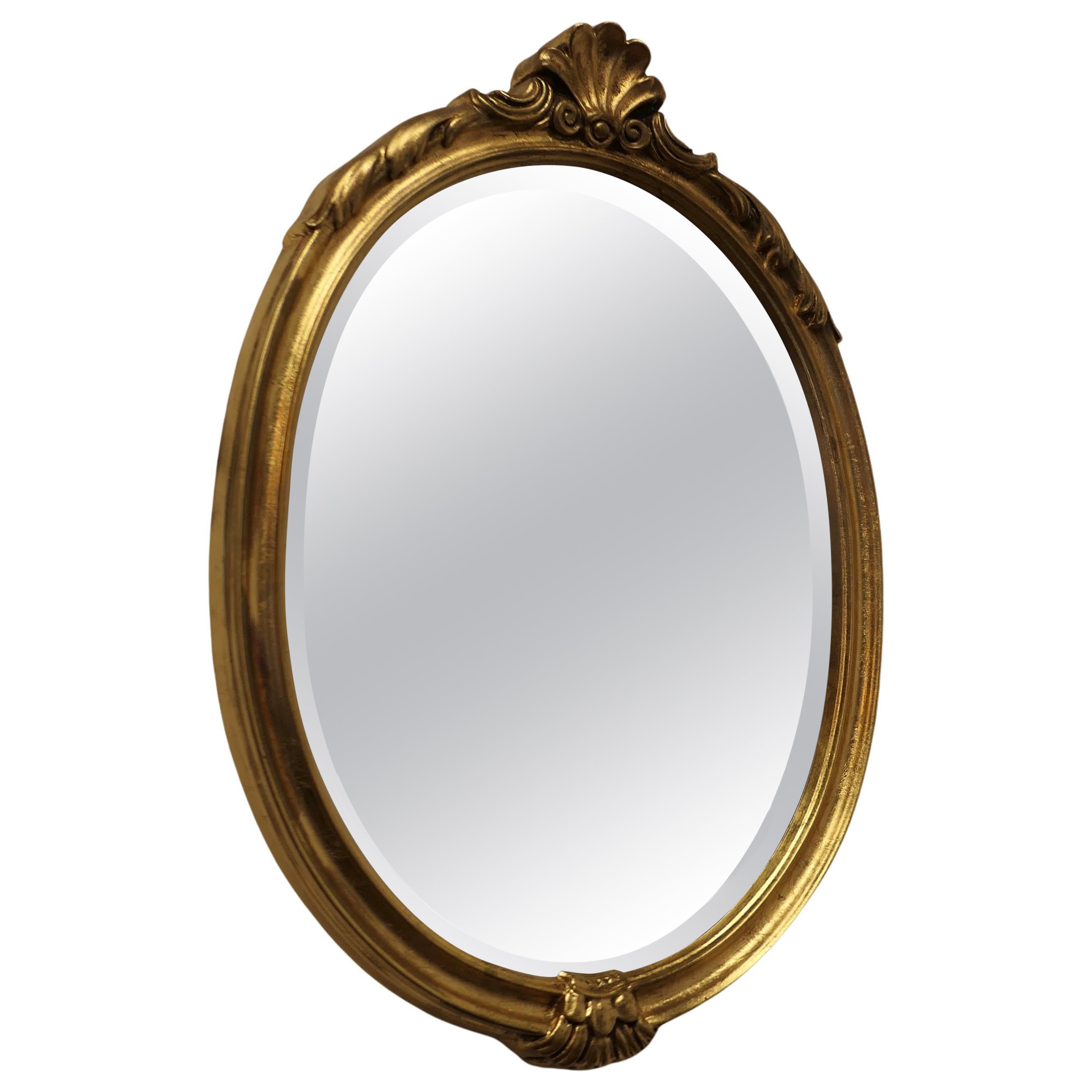 Very Pretty French Oval Gilt Wall Mirror    For Sale