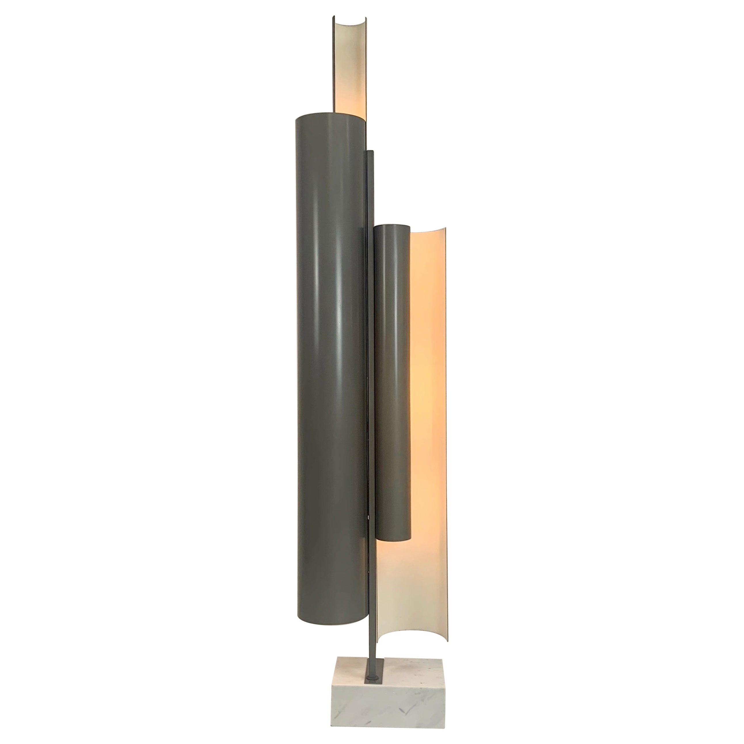 Impressive floor lamp by Pia Crippa Guidetti for Lumi, circa 1970, Italy.
Lacquered aluminum, metal, marble.
Dimensions: 203 cm H, 44 cm W, 26 cm D.
Two switches, 6 E27 bulbs .
Rare model in is original condition.
All purchases are covered by our