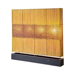 Lamp with woven bamboo wood panels and iron structure.