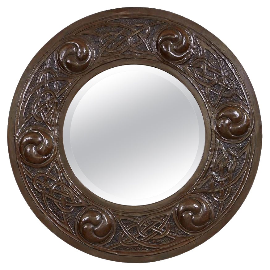 Patinated Repousee Mirror For Sale
