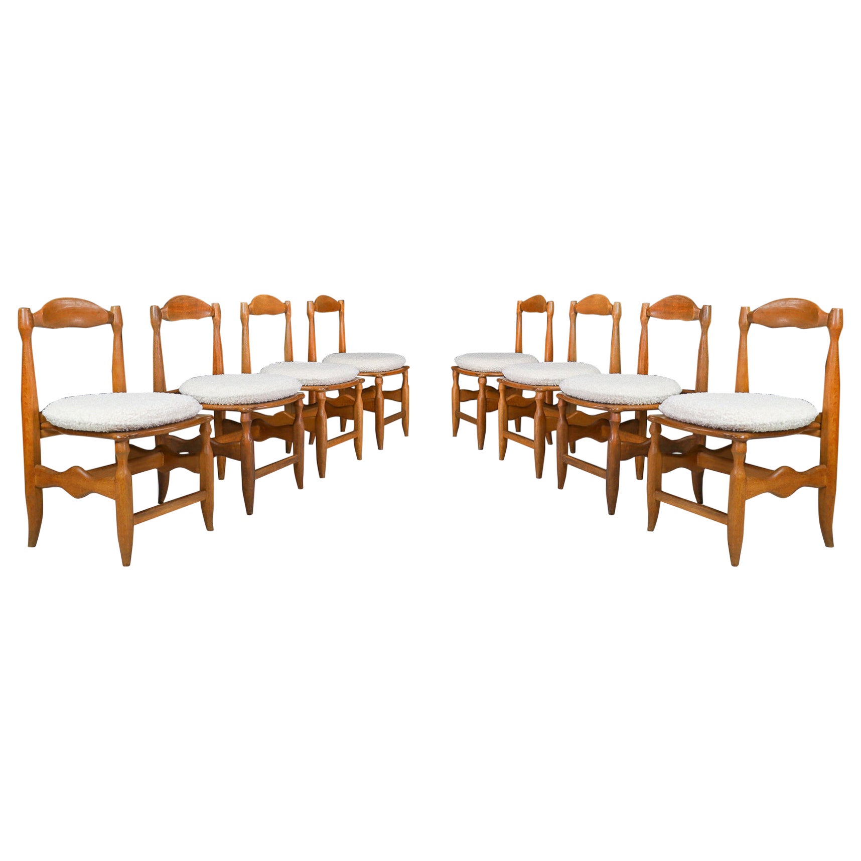 Guillerme & Chambron Set of Eight dining room chairs in Oak and Bouclé France 