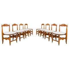Guillerme & Chambron Set of Eight dining room chairs in Oak and Bouclé France 
