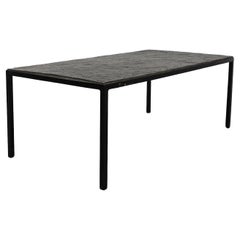 Mesa de centro rectangular Artimeta con tapa de piedra insertada y marco esmaltado en negro