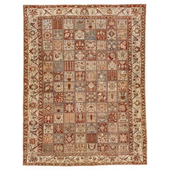 Antique Floral Persian Bakhtiari Rust Wool Rug Handcrafted in the 1920s