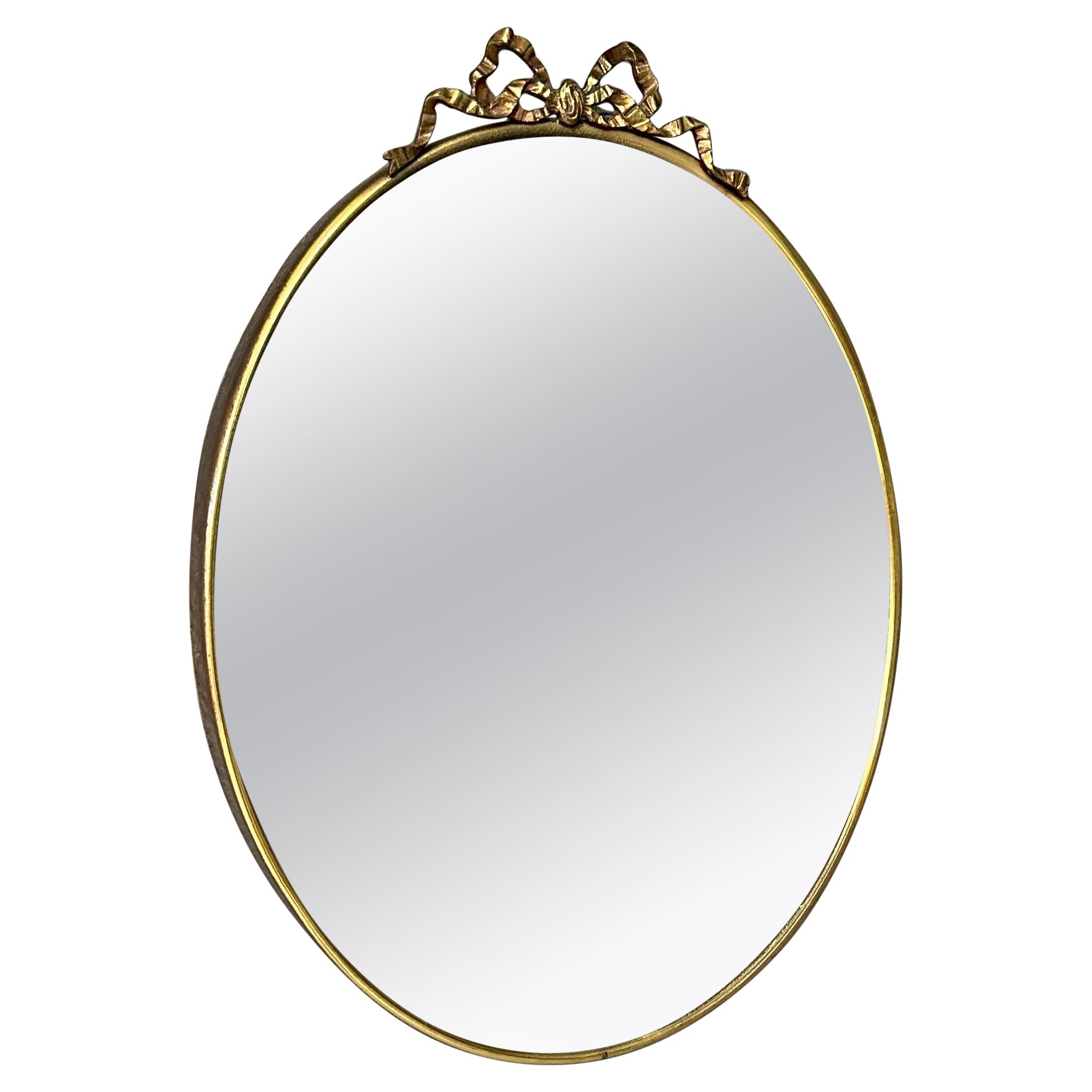 Mid-Century Modern, Oval mirror 1950s, Italian manufacture, with brass frame For Sale
