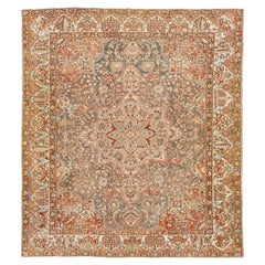 Antique Peach Persian Medallion Bakhtiari Wool Rug was handcrafted in the 1920s