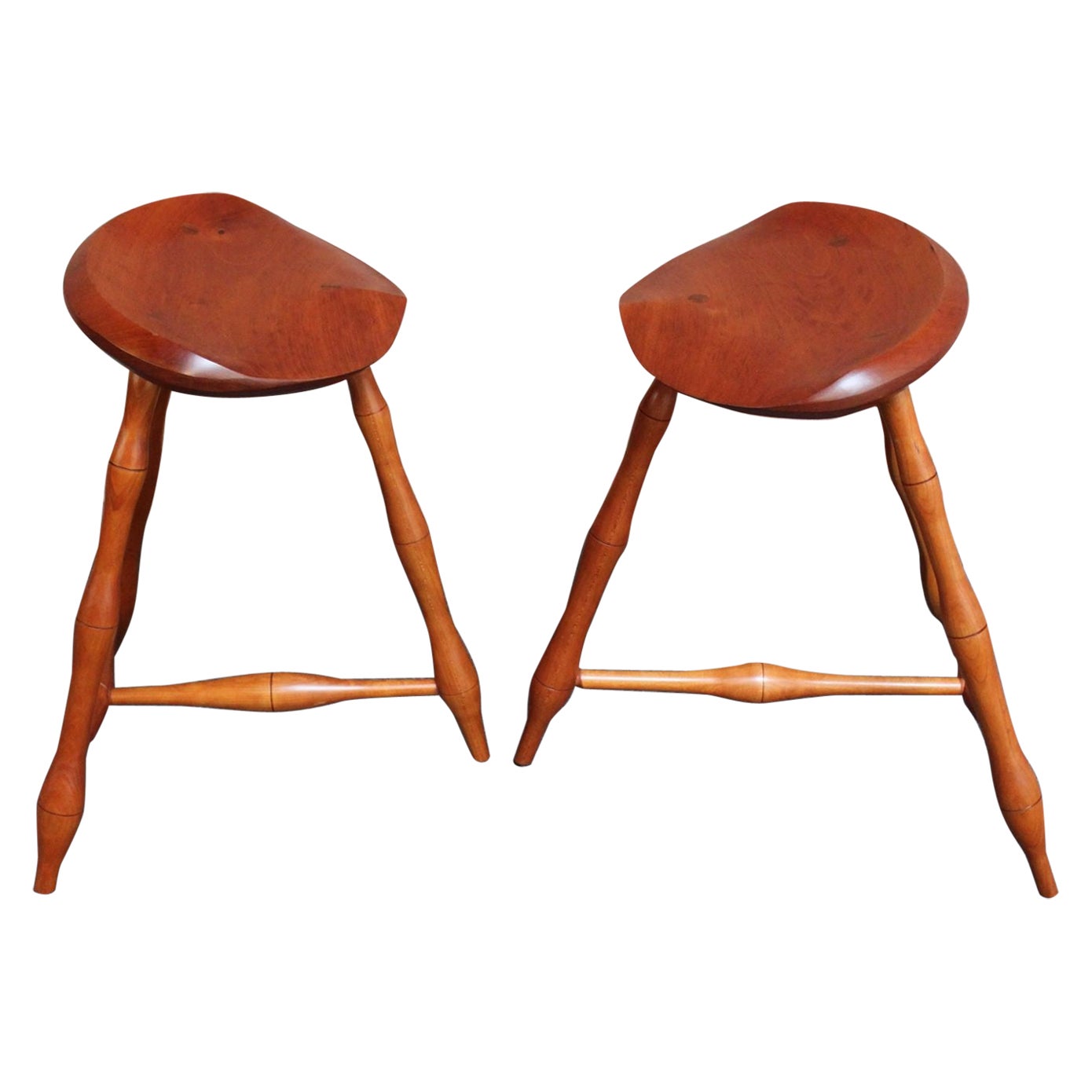 Pair of Vintage Studio Craft Windsor-Style Three Legged Low Stools in Cherrywood For Sale