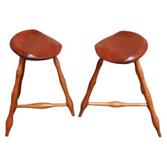 Pair of Used Studio Craft Windsor-Style Three Legged Low Stools in Cherrywood