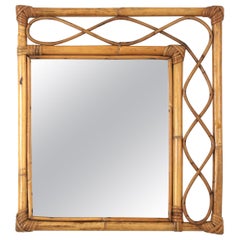 Miroir rectangulaire asymétrique en rotin et bambou de style Franco Albini