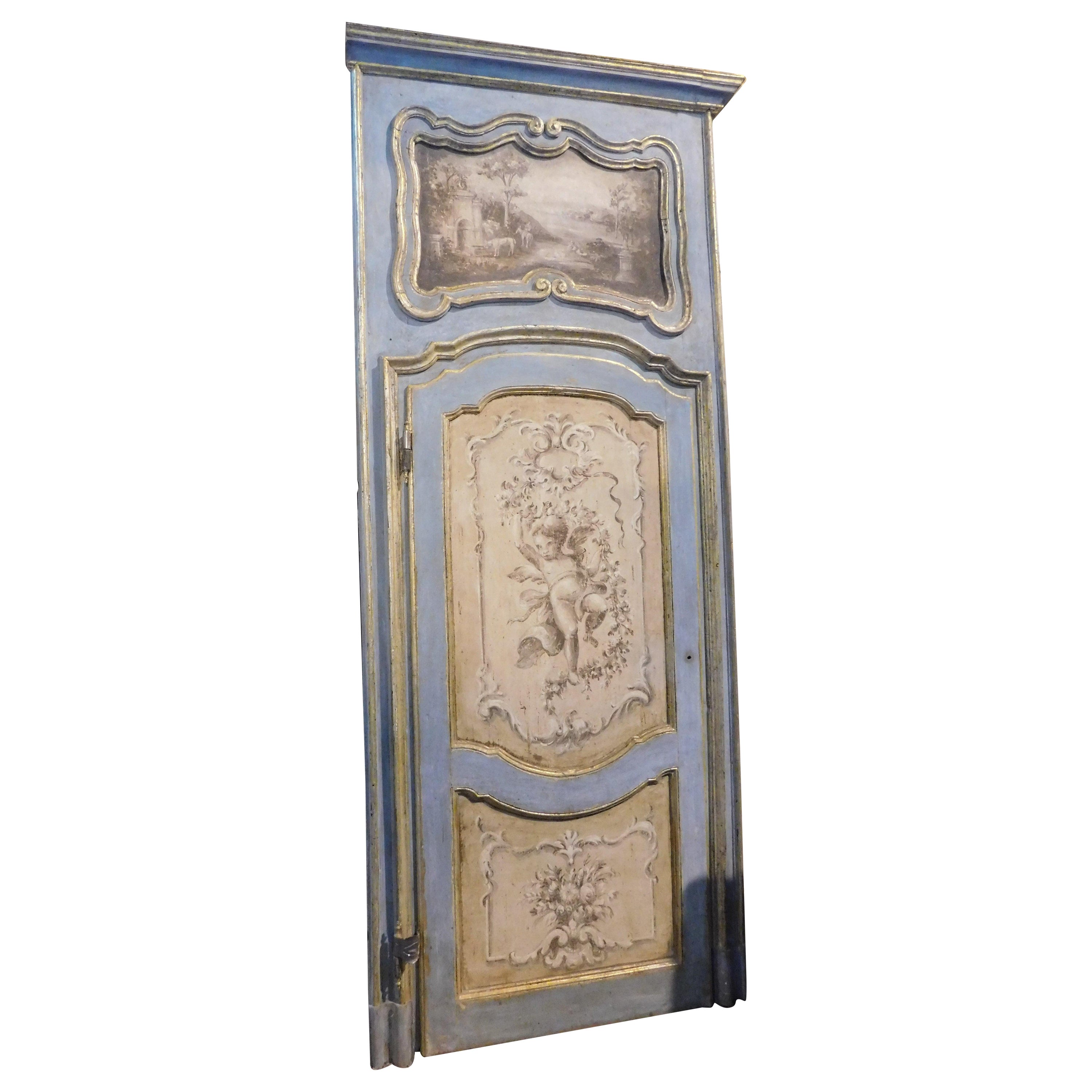 Richly painted and gilded interior door with cherubs and overdoor, Italy