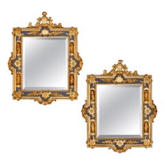 Antique Pair of English Gilt Bronze and Ebonised Wood Mirrors