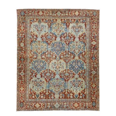 Antique Handmade Persian Bakhtiari Red Wool Rug featuring an Allover Floral Pattern
