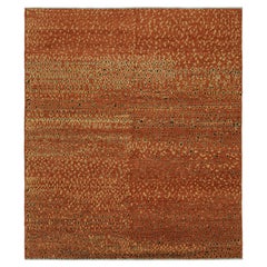 Alfombra de estilo marroquí de Rug & Kilim con motivos geométricos marrones y dorados