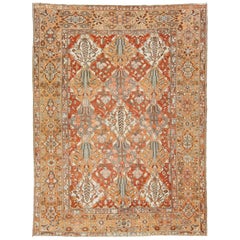 Antique Handmade 1920s Persian Bakhtiari Wool Rug with Floral Motif In Orange 