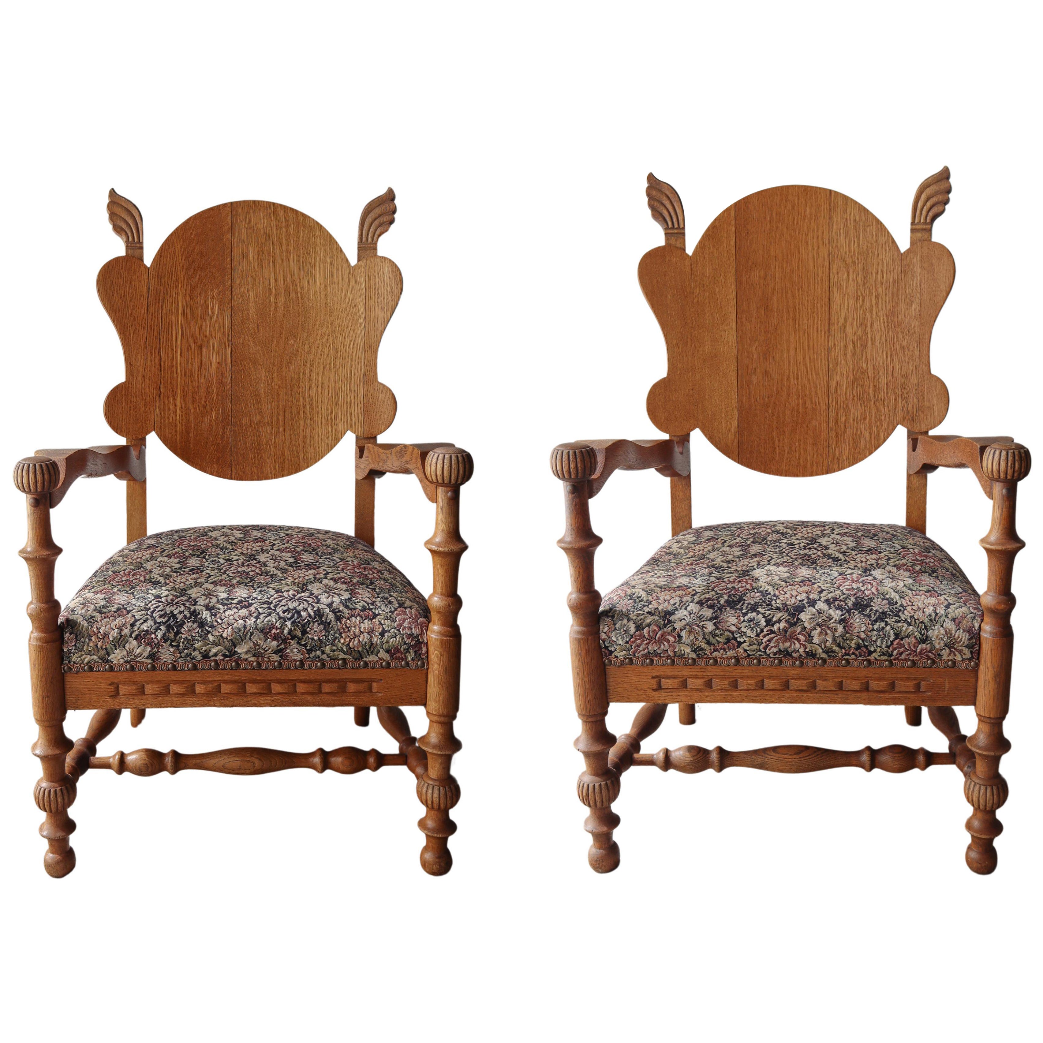 Pair of Antique French Carved Oak Lounge Chairs
