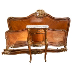 A fine and rare 19th c French King size bed and nightstand by F. Gustave Quignon