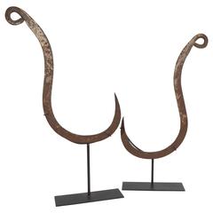 Pair of Mounted Iron Hooks