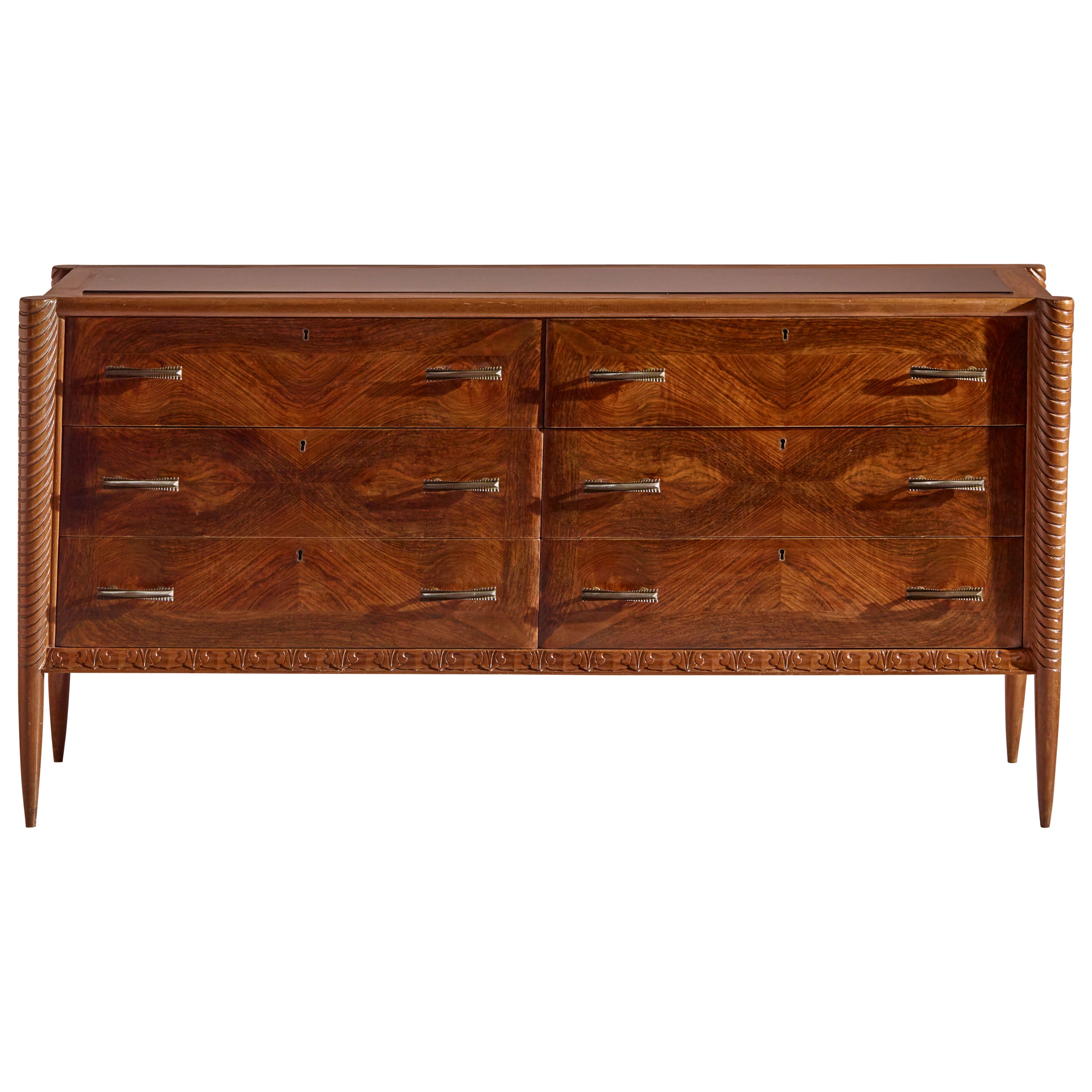 An Italian walnut sculpted chest of drawers with black glass top from the 1940s