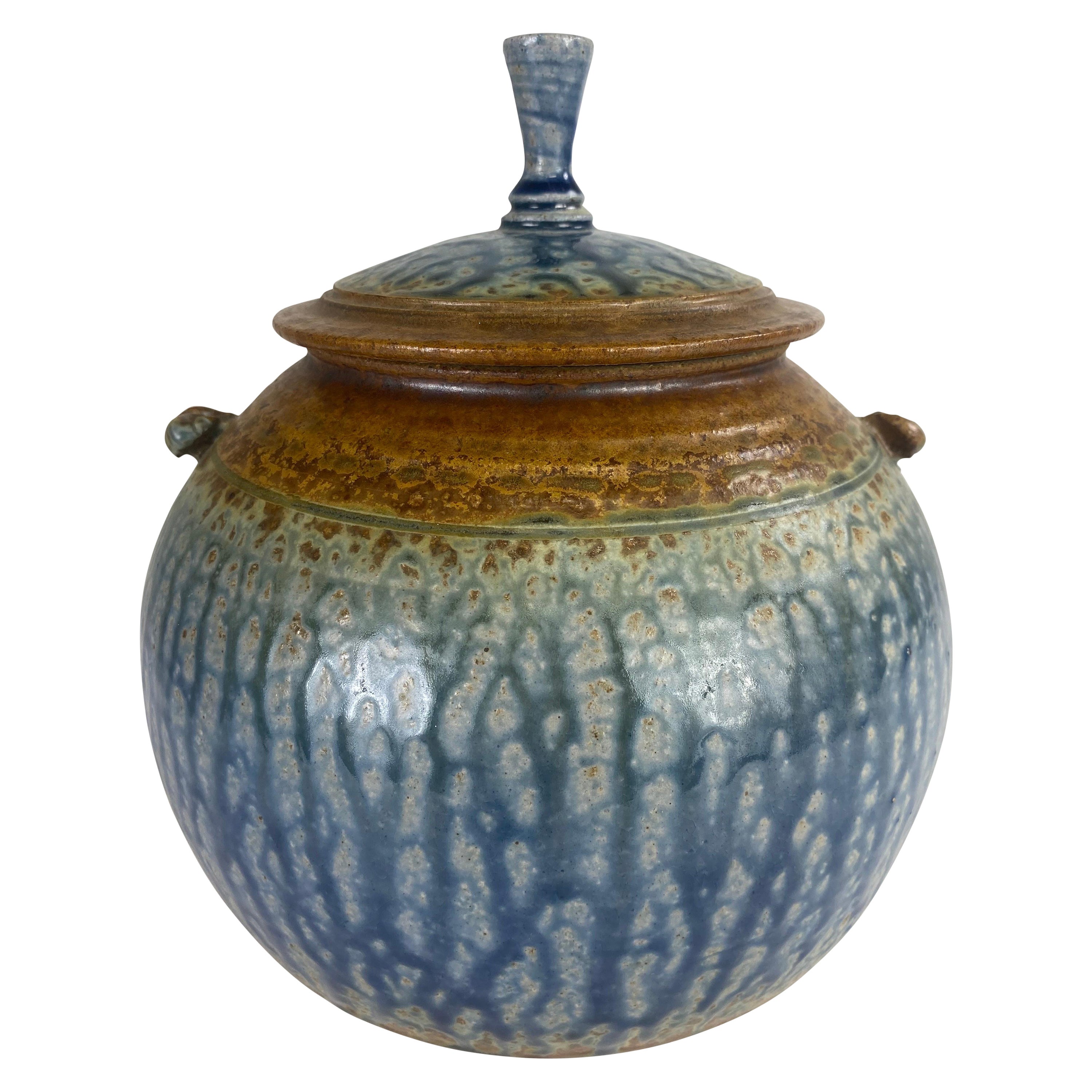 Mid century artisans studio pottery jar with lid.