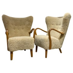Pair of A.Christensen oak armchairs in sheepskin circa 1950