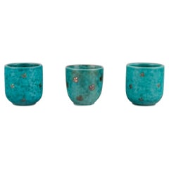 Vintage Wilhelm Kåge for Gustavsberg. Three small "Argenta" ceramic vases. 