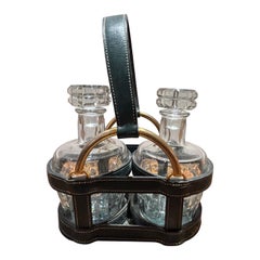 Retro 1950's Hermès set of Decanters in a leather basket holder