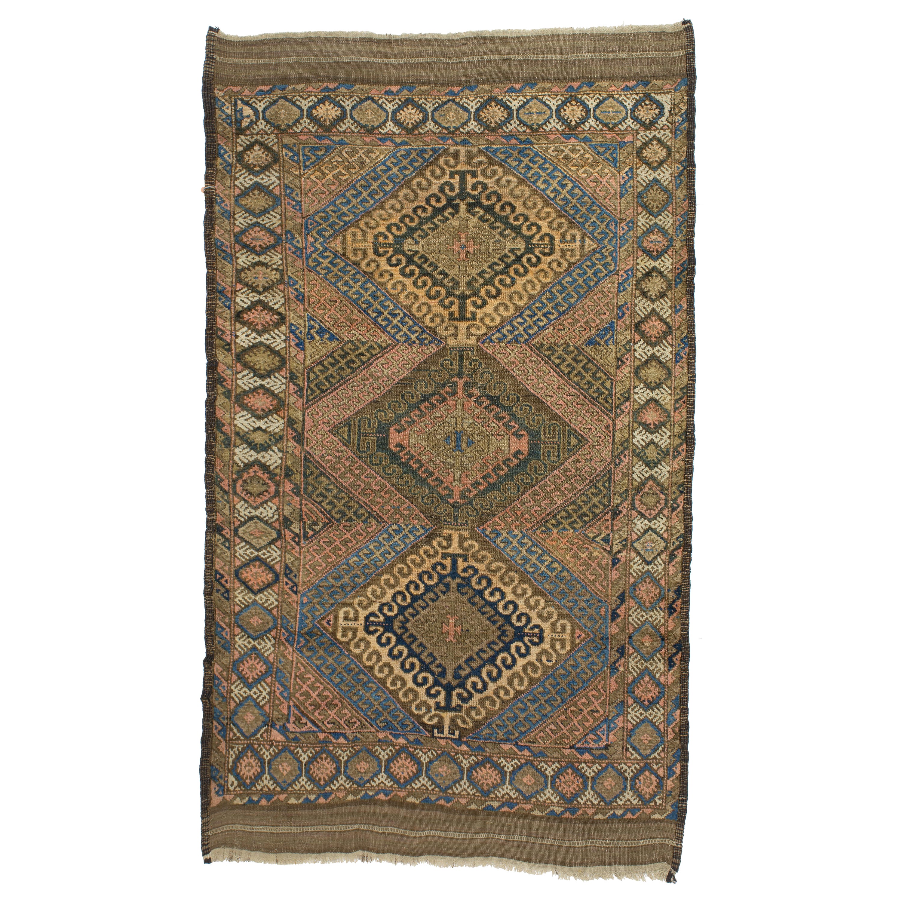 Tapis de baluchon tribal ancien