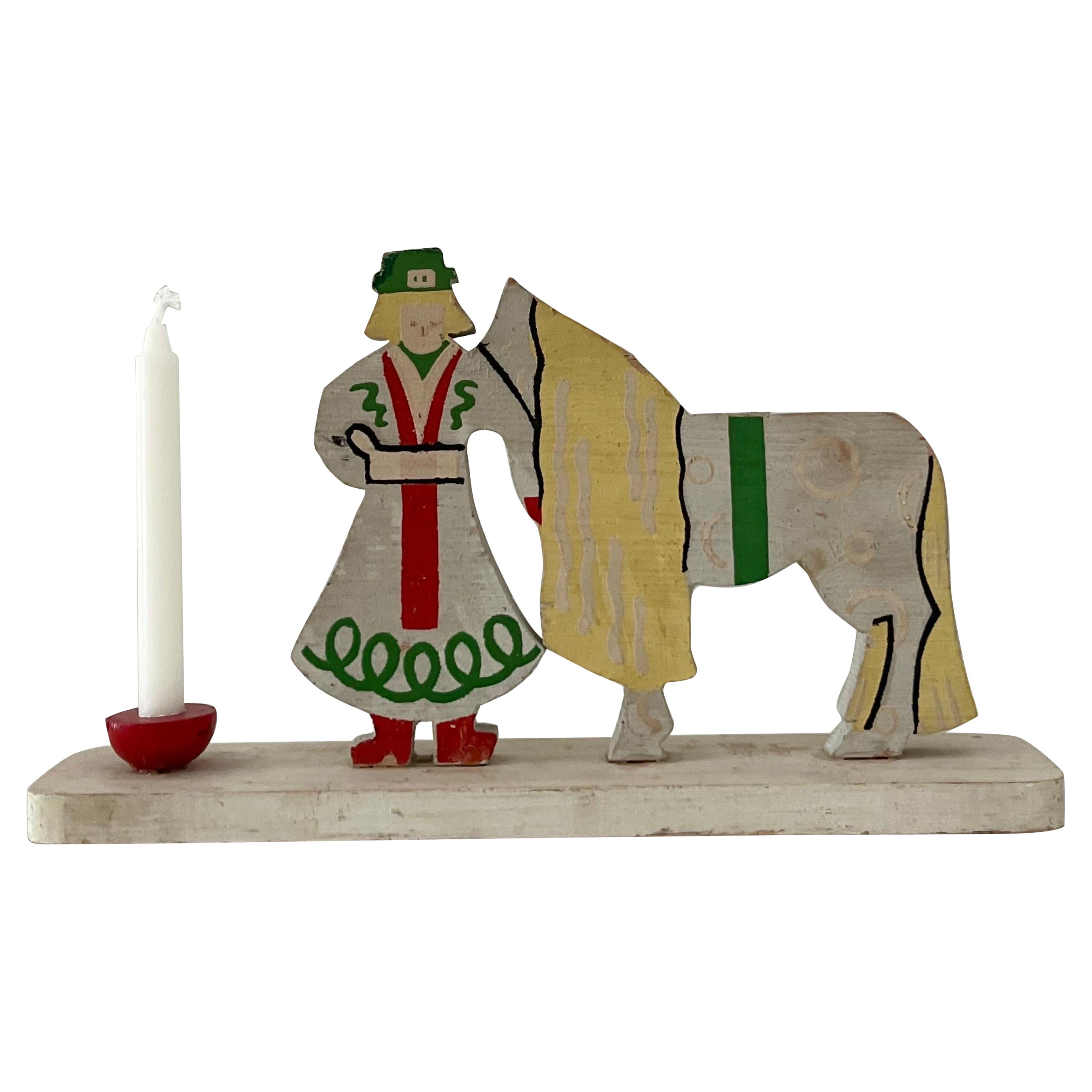 Swedish wood Christmas candle holder w. woman and horse 1960s