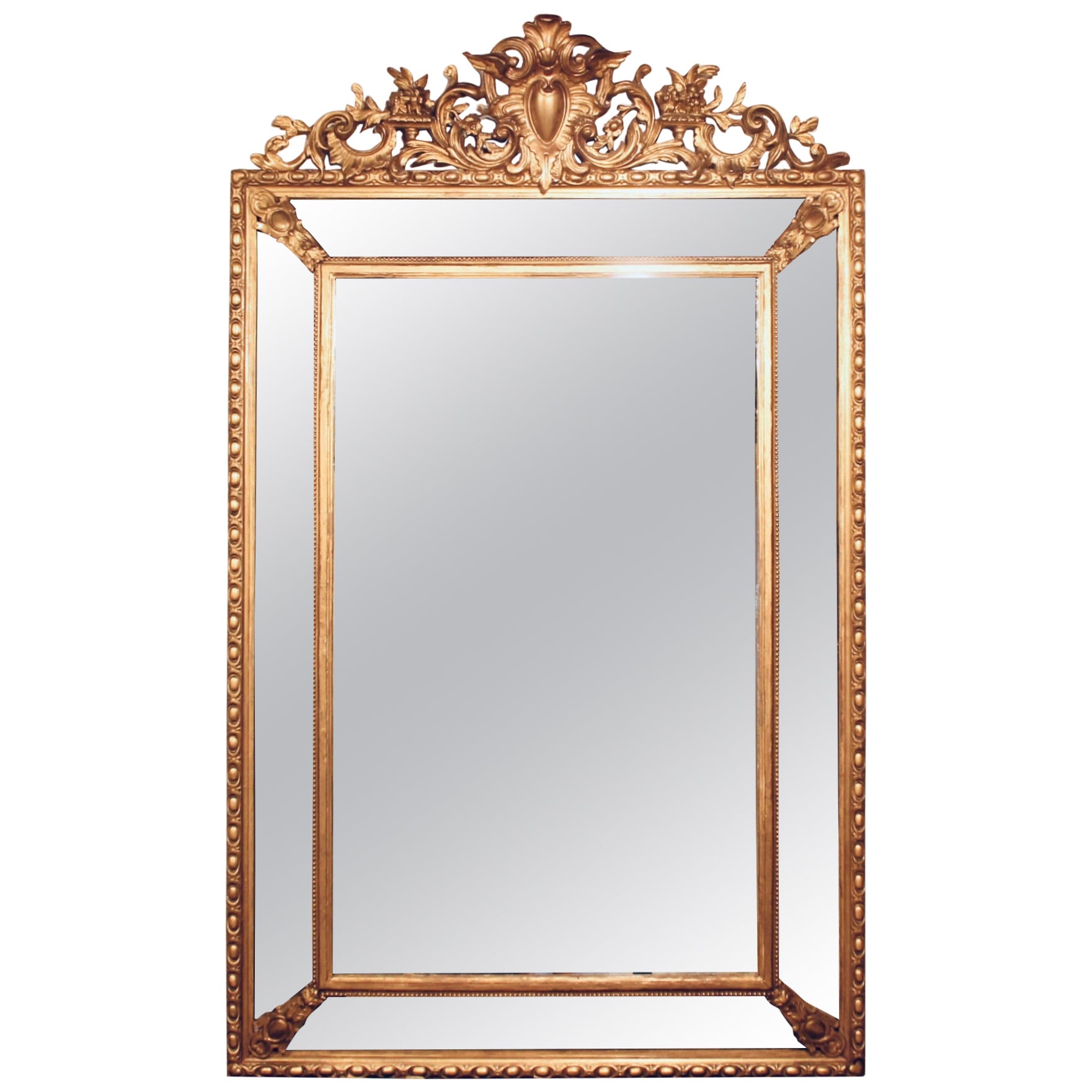 Large French  Borderglass Pier Mirror with Rococo Winged Crest, from Nantes For Sale