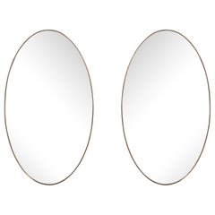 Vintage Pair of Italian Modernist Brass Oval Grand Scale Wall Mirrors, Italy, circa 1950