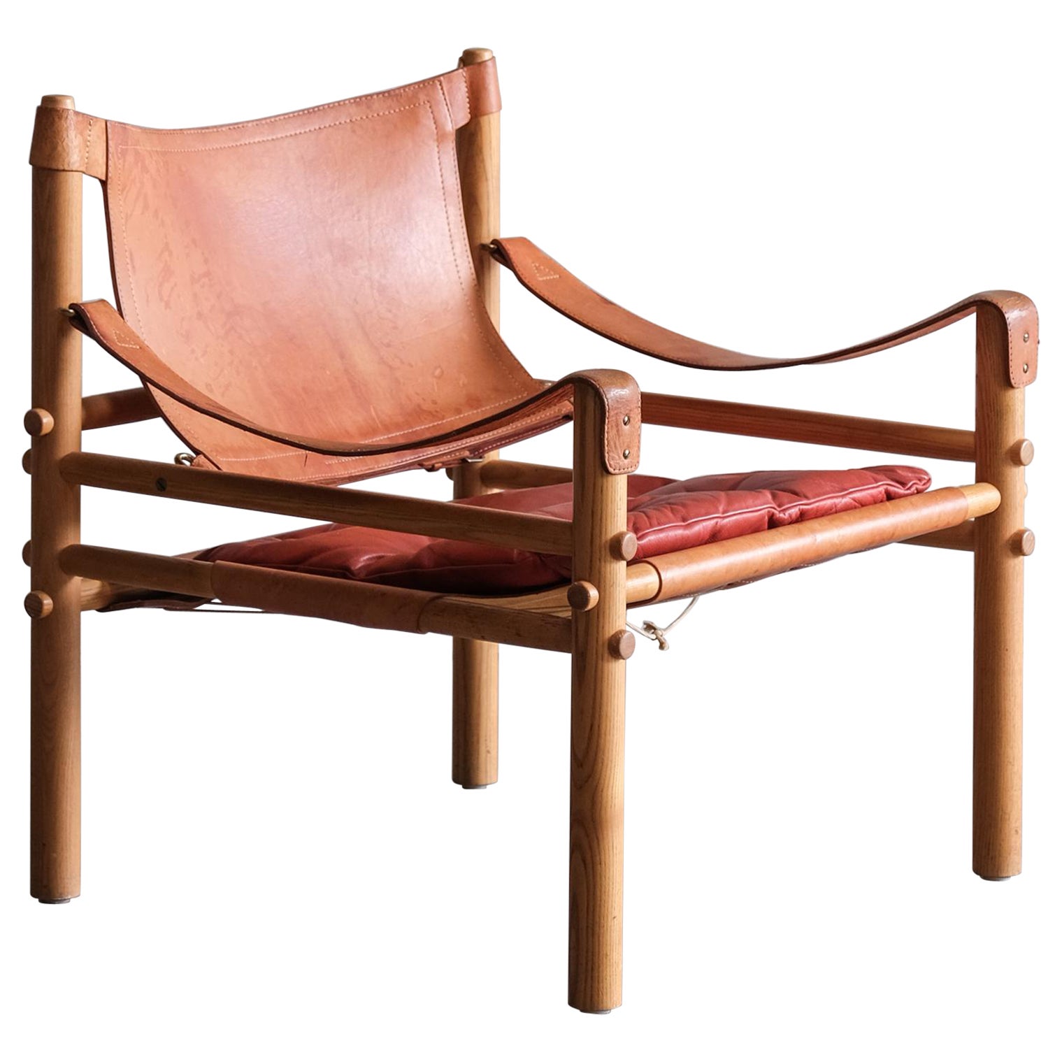 Sirocco Safari chair by Arne Norell in red leather, Sweden 1970