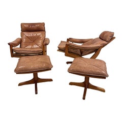 Vintage 1970s soda galvino Denmark solid teak recliners with ottomans 