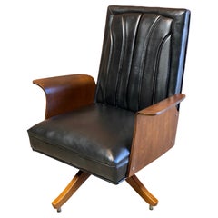 Retro Plycraft Style Walnut Bentwood and Upholstered Swivel Lounge Chair