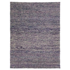 Tapis en laine à la texture contemporaine, fait à la main, avec un design allover violet et bleu
