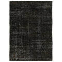 Alfombra persa vintage con tonos negros y marrones, de Rug & Kilim