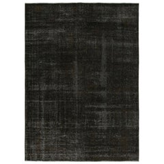 Tapis persan vintage avec des tons noirs et Brown, de Rug & Kilim