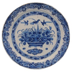 'De Grieksche A', Pieter Kocx - Dutch Delft plate with flower basket