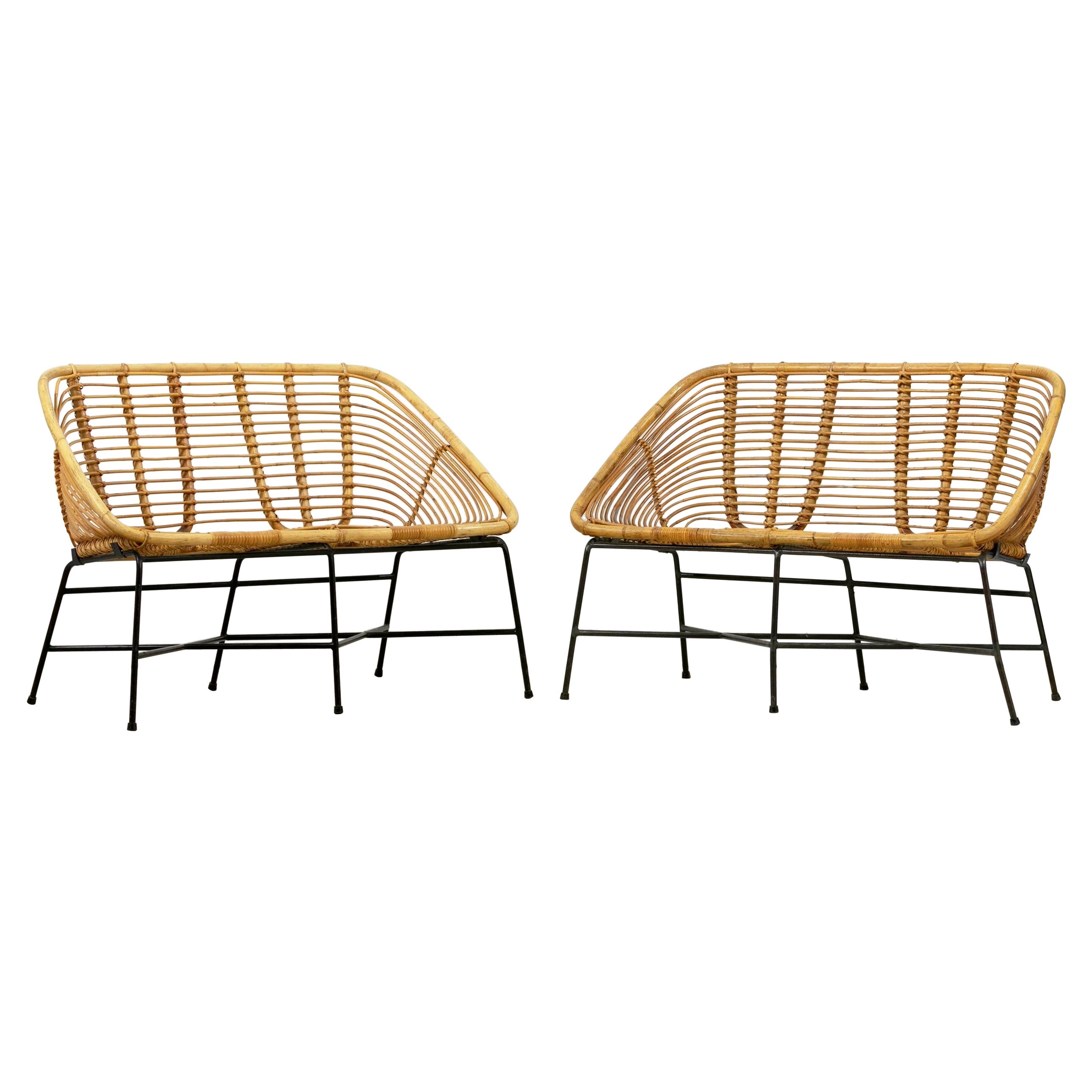 Pair of rattan and lacquered iron bench seats, France, circa 1950