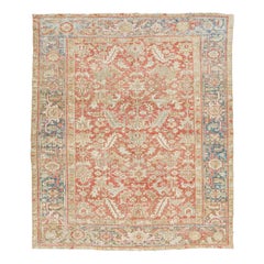 1920s Floral Antique Persian Heriz Wool Rug Featuring a Rust color