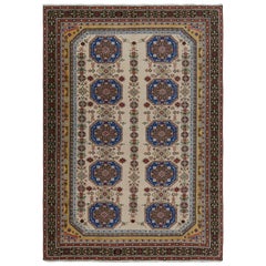 Vintage Hereke-Teppich in Beige, Blau und Gold mit geometrischen Mustern von Rug & Kilim