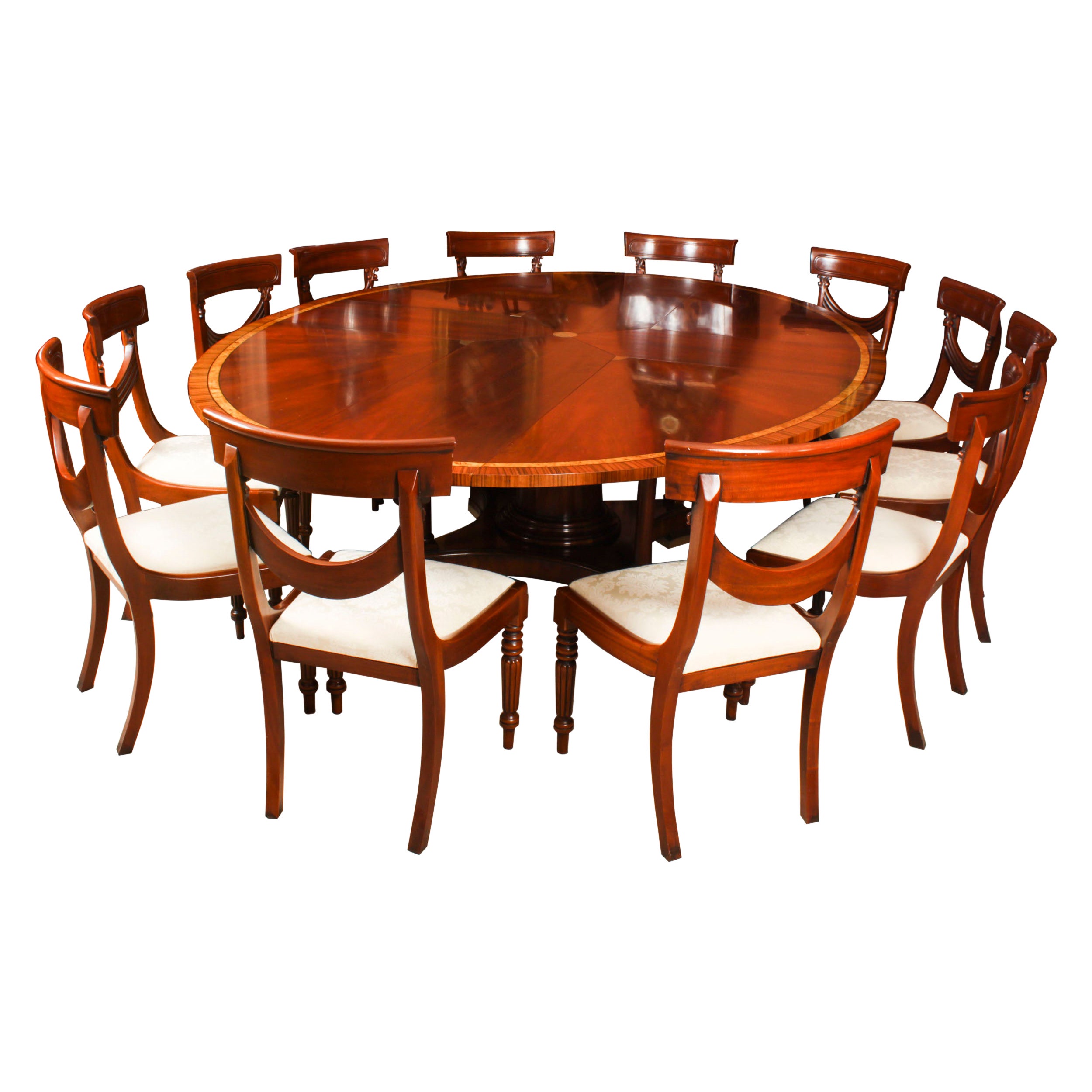 Vintage 9ftx6ft3" Oval Flame Mahogany Jupe Dining Table & 12 chairs 20th Century For Sale