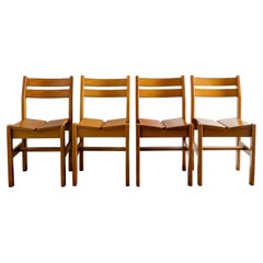 Ensemble de quatre chaises de salle à manger françaises du milieu du siècle par Charlotte Perriand pour Les Arcs