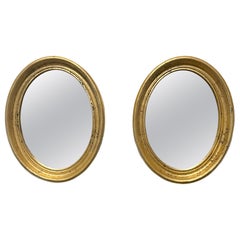 Pair Of Used Gilt Oval Italian Mirrors