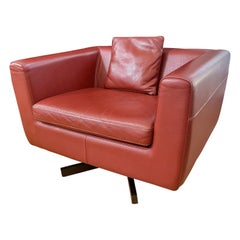 Roche Bobois Swivel Armchair in Brick Red Leather