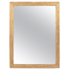 Miroir rectangulaire en bois doré à cannelures