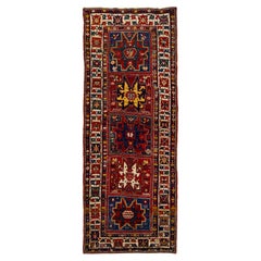 Tapis de couloir caucasien antique en laine fait à la main avec motif multicolore
