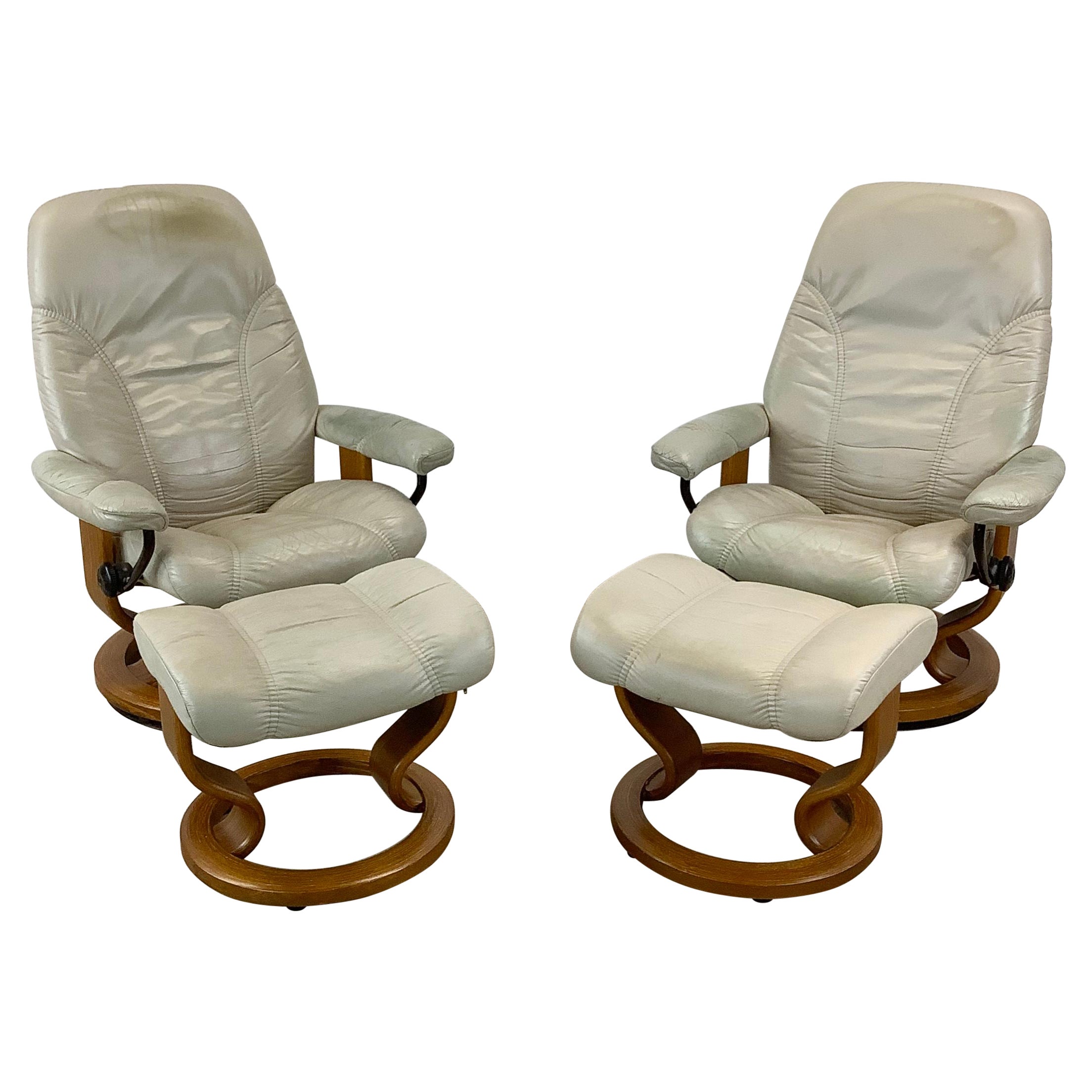 Pair Ekornes Stressless Swivel Chairs with Ottoman