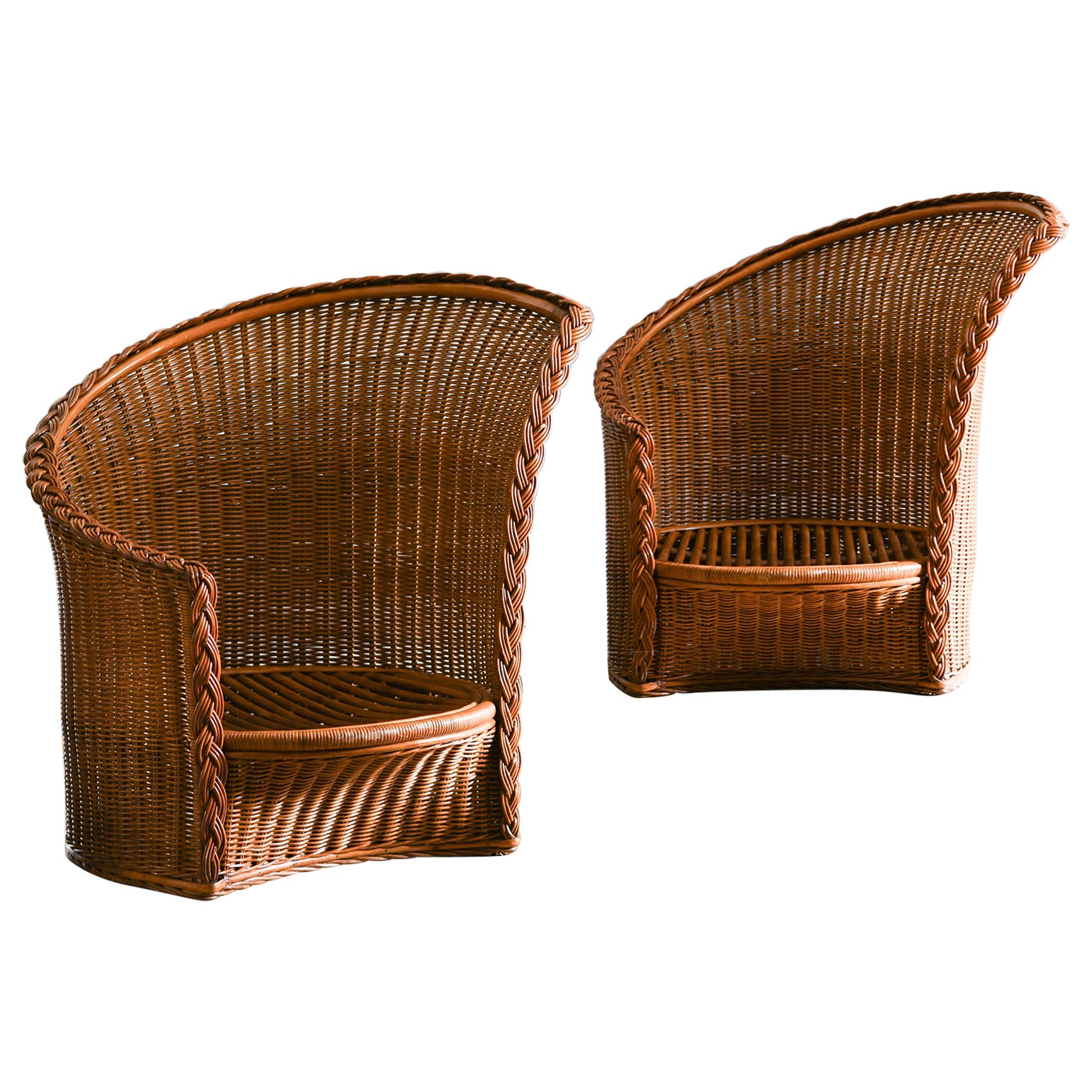 Pair of rattan and wicker armchairs in dark finish, Italy 1980s For Sale