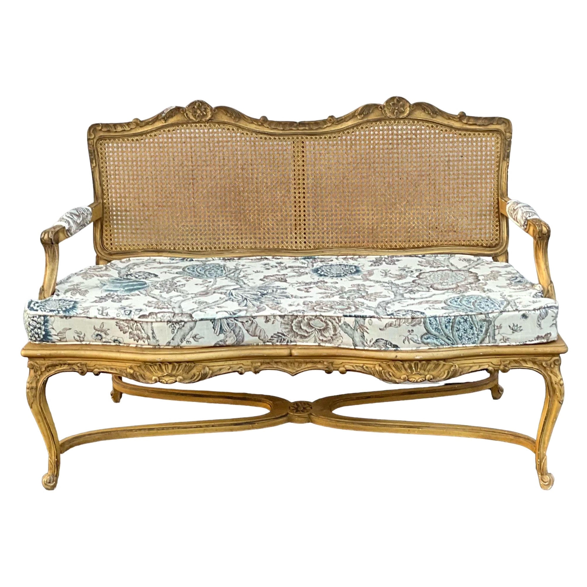 Mid-Century French Louis XV Style Caned and Carved Settee in Floral Linen